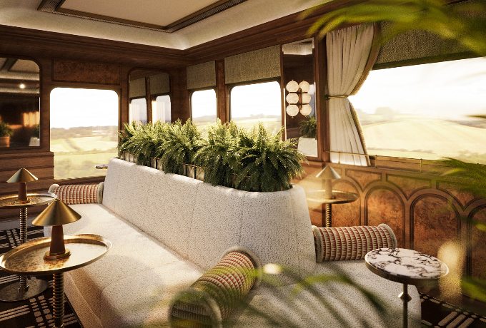 Belmond Britannic luxury train lounge carriage with plush armchairs and panoramic windows