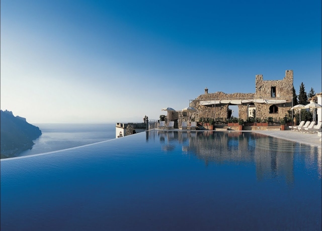 Infinity pool at Belmond Caruso Amalfi Coast with panoramic cliffside views over the Mediterranean Sea