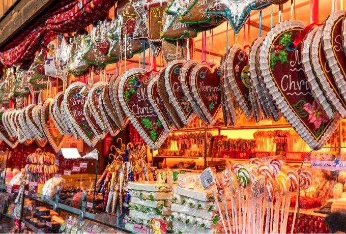 Traditional festive food at a European Christmas market, a must-try on a luxury holiday trip
