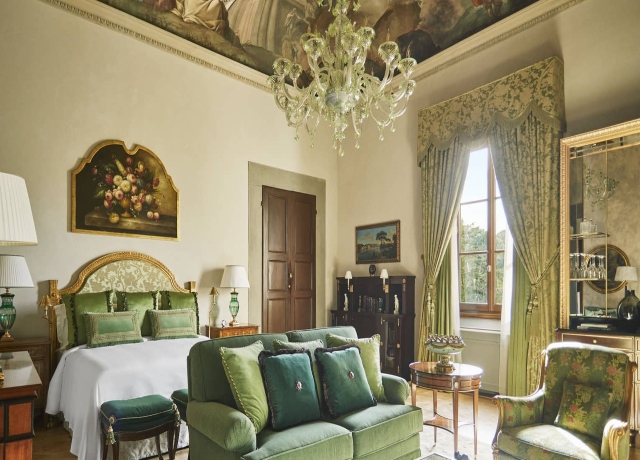 Luxury suite at Four Seasons Florence with vaulted frescoed ceilings and Renaissance details