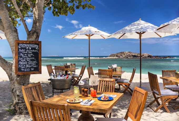 Beachfront dining at St. Regis Punta Mita with panoramic sea view